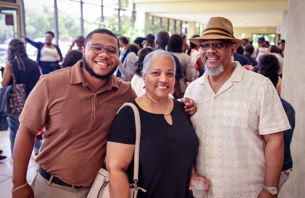 Smiling members fellowshipping after service